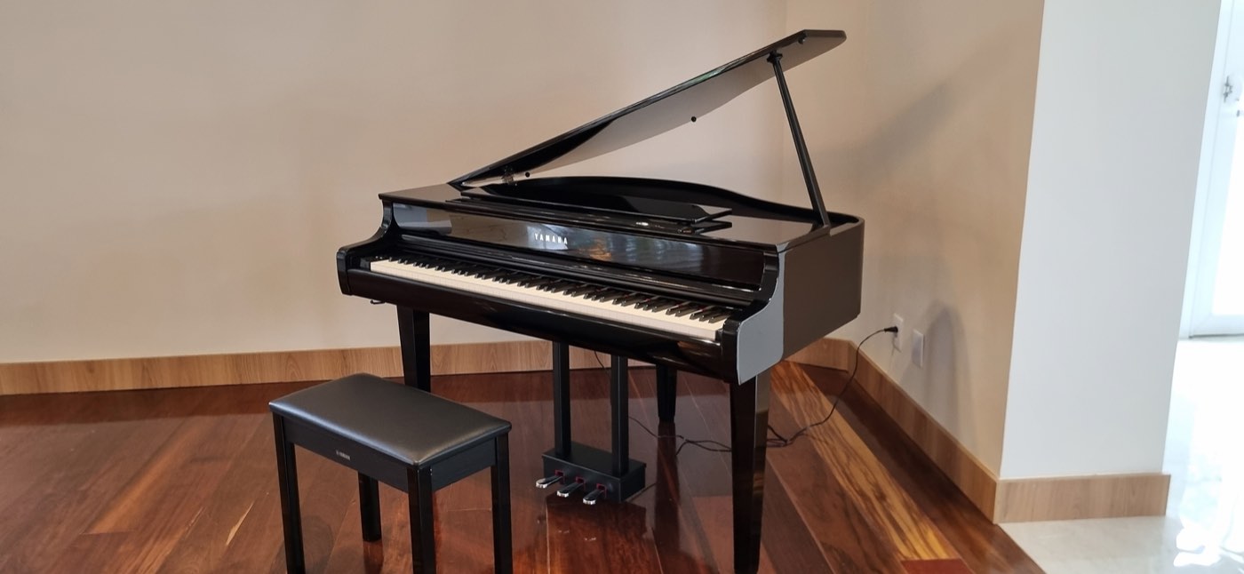 Piano de cauda na sala social do Flat Care